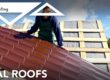 man installing metal roof