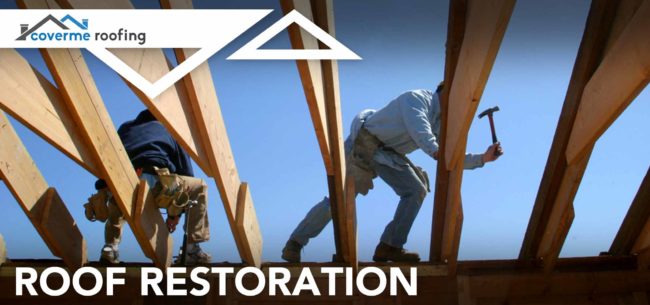 Roof-Restoration two workers repairing roof