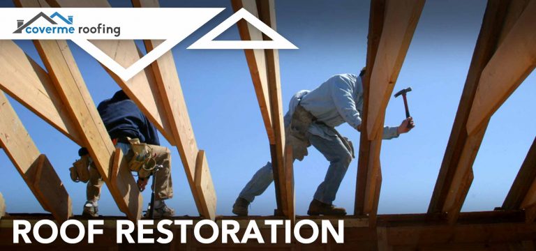 Roof-Restoration two workers repairing roof